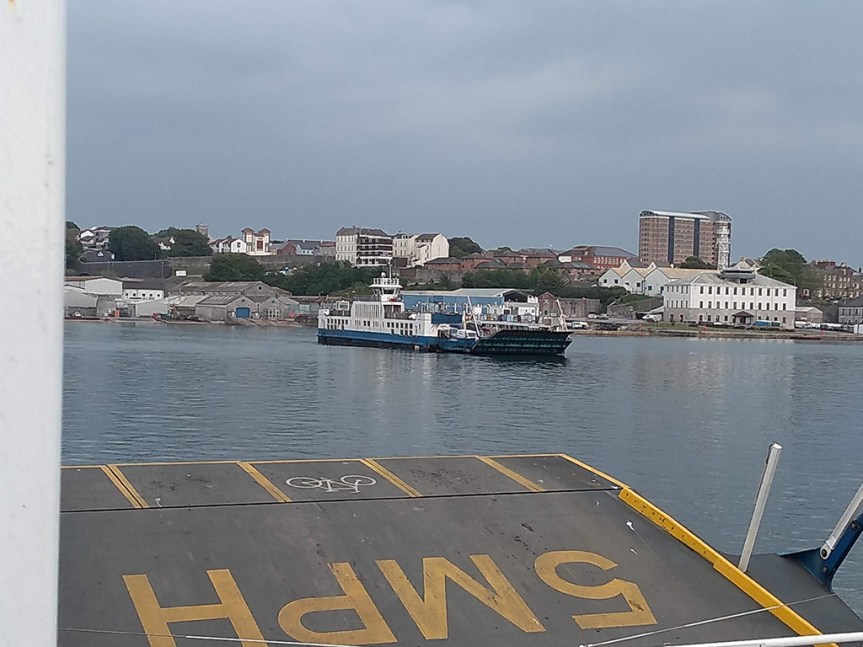 A car ferry crossing the river.